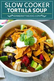 This creamy chicken taco soup recipe is so easy and makes your house smell good all day long because it's made in the slow cooker, or crock pot. Slow Cooker Chicken Tortilla Soup Dinner At The Zoo