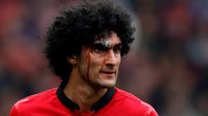 Fellaini took a firm grip on the flowing locks of the arsenal teenagercredit: This Video Shows How Serious Manchester United Liverpool Is