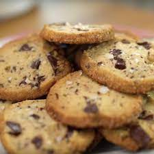 7 Alison Roman Recipes You Ll Want To Make Asap Including Her Chocolate Chunk Shortbread Cookies Roman Food Chrissy Teigen Recipes Yummy Cookies