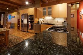 It's actually deep and dark in color, mainly stark black but with a darker cabinets paired with dark countertops create an elegant look but paired with lighter cabinets it can still work wonders. Uba Tuba Granite Countertops Pictures Cost Pros Cons