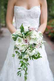 She wants to walk down the aisle holding the flowers that will best represent how she feels on her special day. White Green Lavender Bouquet Http Www Significanteventsoftexas Com Purple Bride Bouquet Purple And Green Wedding White Bridal Bouquet