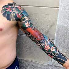Sleeve japanese flower tattoo designs. Men Japanese Arm Tattoo Novocom Top