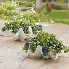 Good to know since i've only seen the mop so far. Seashell Outdoor Planter Grandin Road Outdoor Planters Large Backyard Landscaping Planters