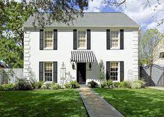 A yellow awning goes well with a white house. 60 Awnings Ideas House Exterior Window Awnings House Styles