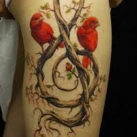Treble clef, musical notes, music notes in a heart, love music, bass clef, treble clef silhouette. Awesome Red Birds And Treble Clef Tattoo On Thigh Tattooimages Biz