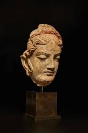 A terracotta head of a donor, Ancient Region of Gandhara, circa 5th century 