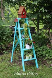 Old wooden ladders are excellent for creating unique and bright holiday decorations. 12 Creative And Rustic Garden Art Ladder Ideas