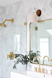 such pretty marble bathroom gold accessories in this modern bathroom decor gold bathroom modern bathroom layouts modern bathroom decor