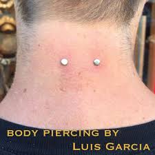 luisgpiercing piercing nape piercing body piercing