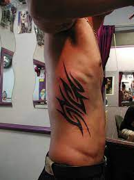 Tribal tattoo artworks has been going on for hundreds and hundreds of years. 23 Interesting Tribal Rib Tattoos And Designs