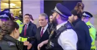 Moment Keir Starmer bundled into police car after angry Jimmy Savile mob  attack - The Mirror