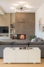 Una Casa In Grecia Dal Mood Scandinavo Interior Break Arredamento Salotto Con Camino Arredamento Sala Con Camino Idee Arredamento Soggiorno