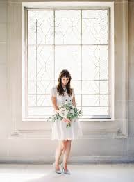 Picture Of A Short Lace Wedding Dress With Lace Cap Sleeves And Light Blue Heels For Somehting Blue
