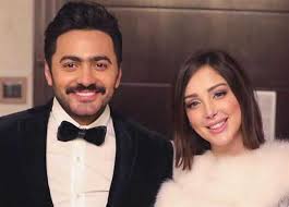 تامر حسني وزوجته صدم المطرب تامر حسني جمهوره في أحدث ظهور له برفقة زوجته المغربية بسمة بوسيل بسبب وجود تغيير ملحوظ في ملامحهما. ØªØ§Ù…Ø± Ø­Ø³Ù†ÙŠ ÙˆØ²ÙˆØ¬ØªÙ‡ ÙŠØ­Ø¯Ø«Ø§Ù† Ø¬Ø¯Ù„ ÙÙŠ Ø£Ø­Ø¯Ø« Ø¸Ù‡ÙˆØ± Ù„Ù‡Ù…Ø§ Ø§Ù„Ù…ØµØ±ÙŠ Ø§Ù„ÙŠÙˆÙ…