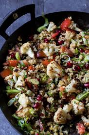 Roasted Cauliflower And Pomegranate Tabbouleh Salad Salted Mint Recipe Cauliflower Tabbouleh Vegetarian Recipes Salad Recipes