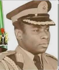 The image shows Major General Tunde Idiagbon, a prominent figure in  Nigerian military history. He served as the Chief of Staff, Supreme  Headquarters (effectively the second-in-command) during the military regime  of Major