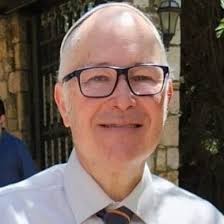 I was here for over 2 years before I realized this isn't a picture of a  golf ball. The worst part is that it's hanging directly across from my  desk. It wasn't