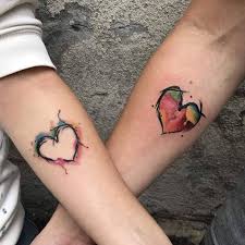 Here are 15 amazing arrow tattoos for females, from pretty designs: 1001 Ideas For Matching Couple Tattoos To Help You Declare Your Love