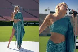 The new clip and song was inspired by female. Miley Cyrus Bares Abs In Beatles Inspired Dress For Global Citizen Performance