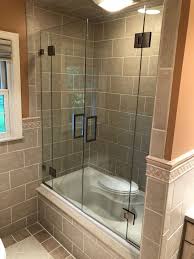 Frameless French Doors Tub Enclosure Designed And Installed In Califon Nj By Exceptional Glass 201 Frameless Shower Doors Glass Shower Doors Bathroom Design