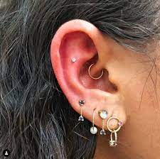 29 Insanely Cool Ear Piercing Ideas That Ll Have You Rolling Up To Claire S Asap Ear Jewelry Dangly Earrings Cool Ear Piercings