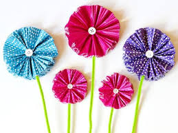 So you might want to craft up a few of these with the kids and gift them to a mother you know now add them to your vase or wrap them with ribbon and they are ready for giving. How To Make Paper Flowers Using Cupcake Liners Easy Paper Flowers Cupcake Liner Flowers Paper Flowers Diy Easy