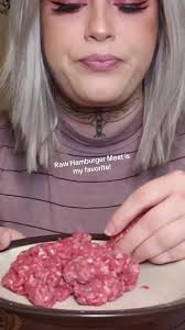 Woman Eating Raw Hamburger Meat