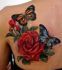Whoops Rose And Butterfly Tattoo Butterfly Tattoo Designs Rose Tattoo Design