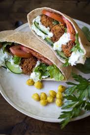 Falafel Pitas With Tzatziki Sauce Recipe Recipe Greek Recipes Tzatziki Sauce Falafel Pita