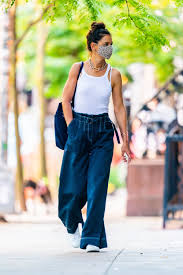 Dressed in a particularly slimming ensemble made up of skinny leg maroon jeans and a tight blue turtleneck sweater, the starlet showed off her. Katie Holmes Steps Out In The Look Of Summer Vogue