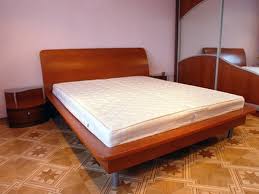 How To Use A King Size Bed Frame Without A Box Spring Hunker In 2020 King Size Bed Frame Mattress King Size Bed