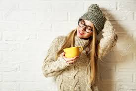 Mkay.1 ball lionbrand heartland yarn or a similar yarn wound into 2. Romantic Dreaming Hipster Girl In Knitted Sweater And Beanie Hat With A Mug In Hands At White Brick Wall Background Winter Warming Up Concept Stock Photo Picture And Royalty Free Image Image