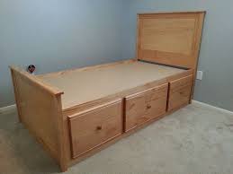 The twin size bed has a wooden frame structured that comes with side rails made of metal which offer an added stability. Twin Bed With Storage Diy Twin Bed Frame Bed Storage Diy Twin Bed