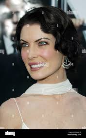 Lara flynn boyle men in black hi-res stock photography and images