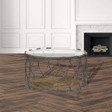The hidden treasures industrial trunk coffee table with storage, made by hammary, is brought to you by lindy's furniture company. Hammary Hidden Treasures Round Cocktail Table Davids Furniture Interiors