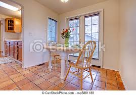 Dining area when becomes a part of living room, this floor tile gives a modern yet sophisticated look malaga tile centre is a is well known for blending their clientele needs and trending tile designing. Happy Dining Room With Orange Tile Floor Canstock