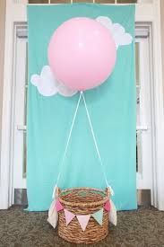 Low Budget Balloon Decoration Ideas For Birthday Party At Home 17 First Birthday Party Ideas For Moms On A Budget Thegoodstuff In 2020 Girls Birthday Party Baby First Birthday Baby Shower Balloons