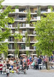 mehr als wohnen is a housing co operative situated in hunziker just north of zurich the precinct which trans facade texture green facade housing development