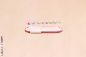 Increase your typing speed and accuracy with free tests, available online. Pregnancy Test Pack Positive Result At Wooden Table And Text Positive From Colorful Alphabet Cube Bead Stock Photo Adobe Stock