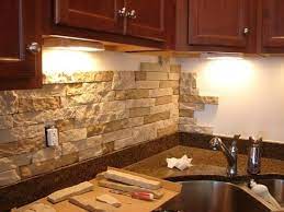 The traditional tile backsplashes involve grout and several other steps that looked overwhelming to me. Diy Stone Back Splash From Airstone No Power Tools Or Grout Priced At Lowe S For 50 For 8 Sq Ft Diy Kitchen Backsplash Diy Stone Backsplash Sweet Home