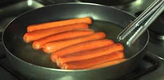 Once water is boiling, use tongs to immerse the hot dogs in the water. Easy Tricks To Hotdogs On Electric Griddles Skillets And Frying Pans