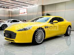 Image result for New Yellow 2016 Aston Martin