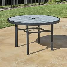 For smaller spaces such as porches or patios, a round patio side table or compact outdoor furniture can create a warm and inviting ambiance. Backyard Creations Denali Round Dining Patio Table At Menards