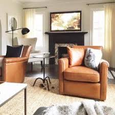 Rogan ii leather cafe latte swivel glider recliner $750. Irving Roll Arm Leather Swivel Armchair Brown Leather Chair Living Room Leather Chair Living Room Arm Chairs Living Room