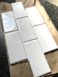 The contrasting grout warms up the white tile, preventing any sense of sterility while adding depth and dimension. Choosing The Right Grout Color For Subway Tile Help We Can T Decide One Hundred Dollars A Month
