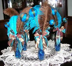 Blue, turquoise, indigo, green, purple, navy, orange and gold. Awesome Decorations Peacock Feather Wedding Table Decorations