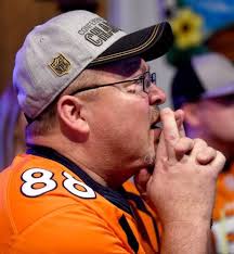 Sunday's Denver faithful find victory and fellowship at Tiny's Tavern