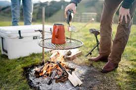This Ultimate Campfire Grill Turns Your Fire Pit Into A Tiered Cooking Machine With A Winch In 2020 Fire Pit Outdoor Fire Pit Designs Campfire Grill