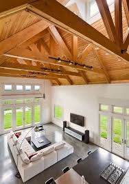 Tom kessler photography this is an example of a traditional porch design in omaha with decking and a roof extension. 8 Lighting For Rafters Beams Ideas Exposed Beams Beams Attic Renovation
