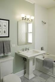 Pale Green With Grey Is A Always Good Bathroom Color Combination And Can Evoke A Feeling Of Calm Traditional Bathroom White Subway Tile Bathroom Pedestal Sink